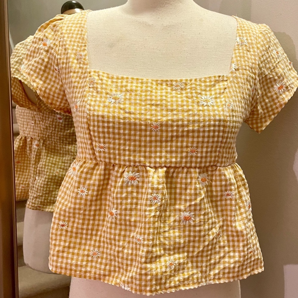 Kirious mustard yellow gingham smocked top with embroidered daisies.